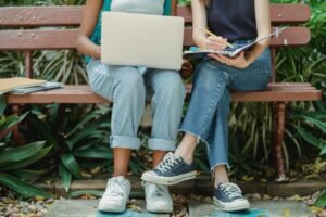 two females doing research